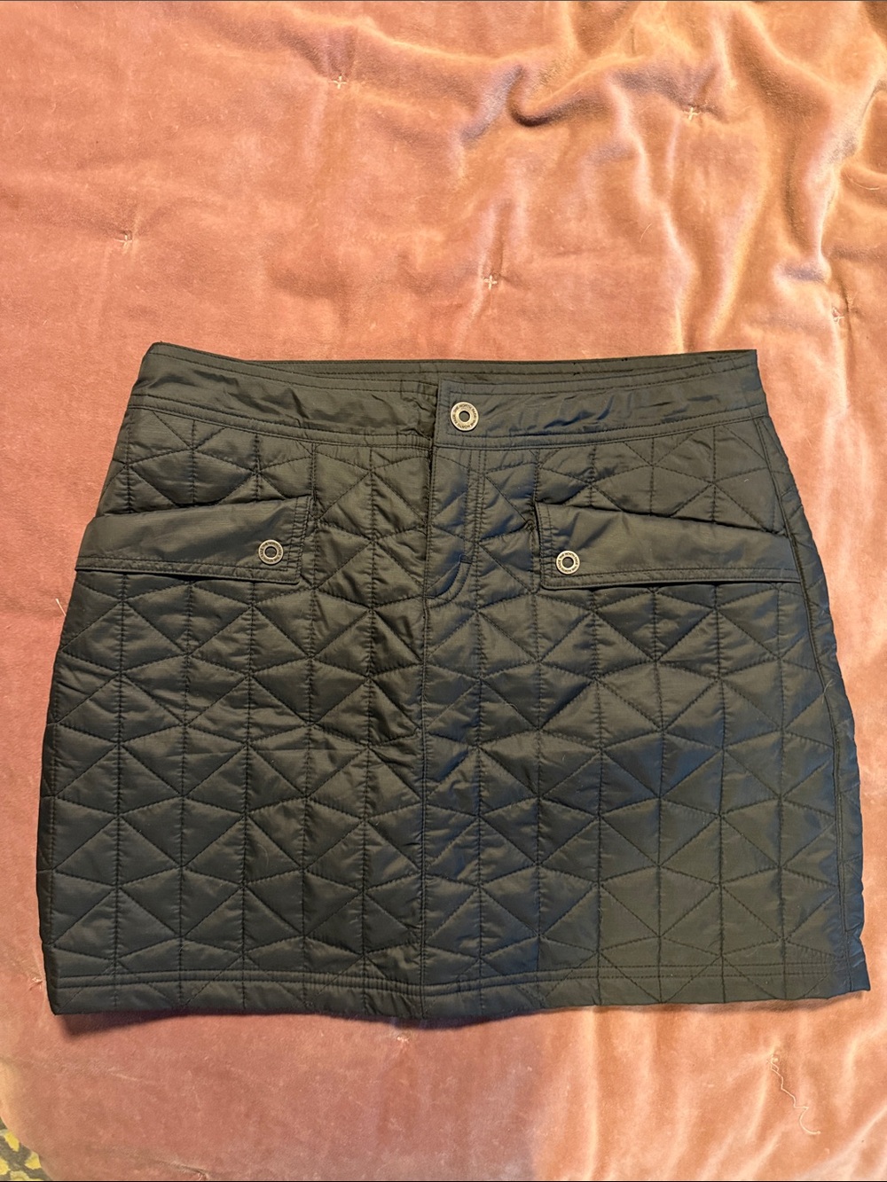 The North Face Black Quilted Mini Skirt with Flap Pockets